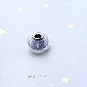 Authentic PANDORA-Murano glass field flowers purple.